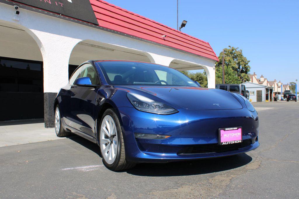used 2022 Tesla Model 3 car, priced at $23,500