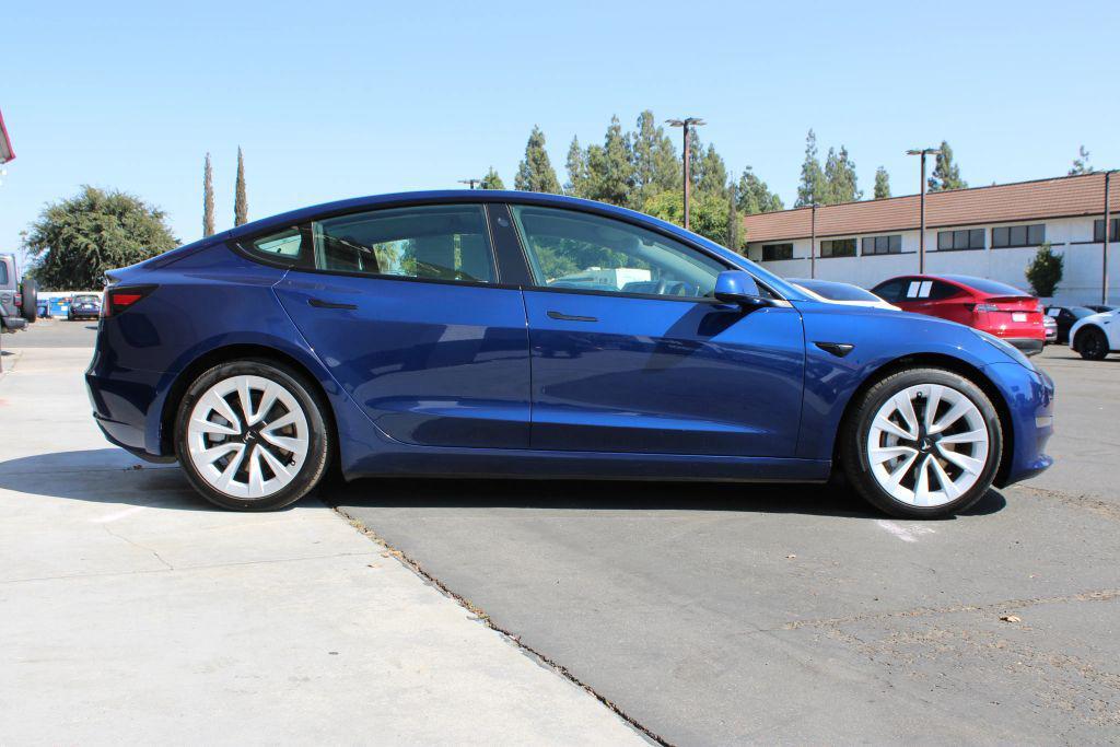 used 2022 Tesla Model 3 car, priced at $23,500
