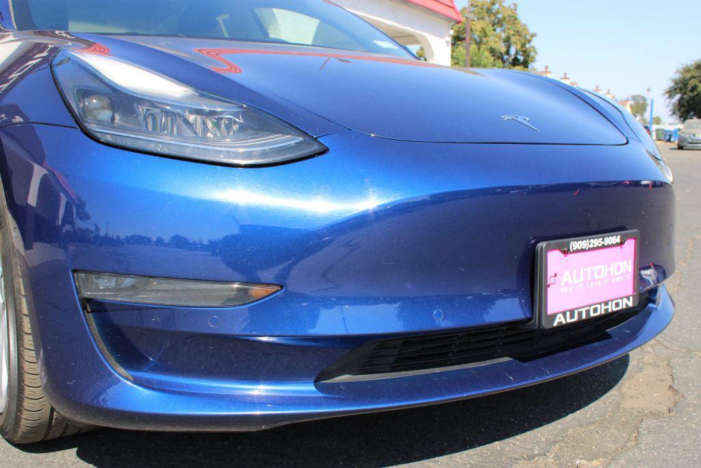 used 2022 Tesla Model 3 car, priced at $23,500
