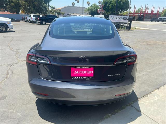 used 2022 Tesla Model 3 car, priced at $24,500