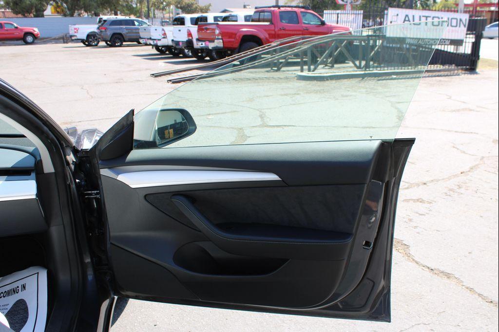 used 2023 Tesla Model 3 car, priced at $25,000