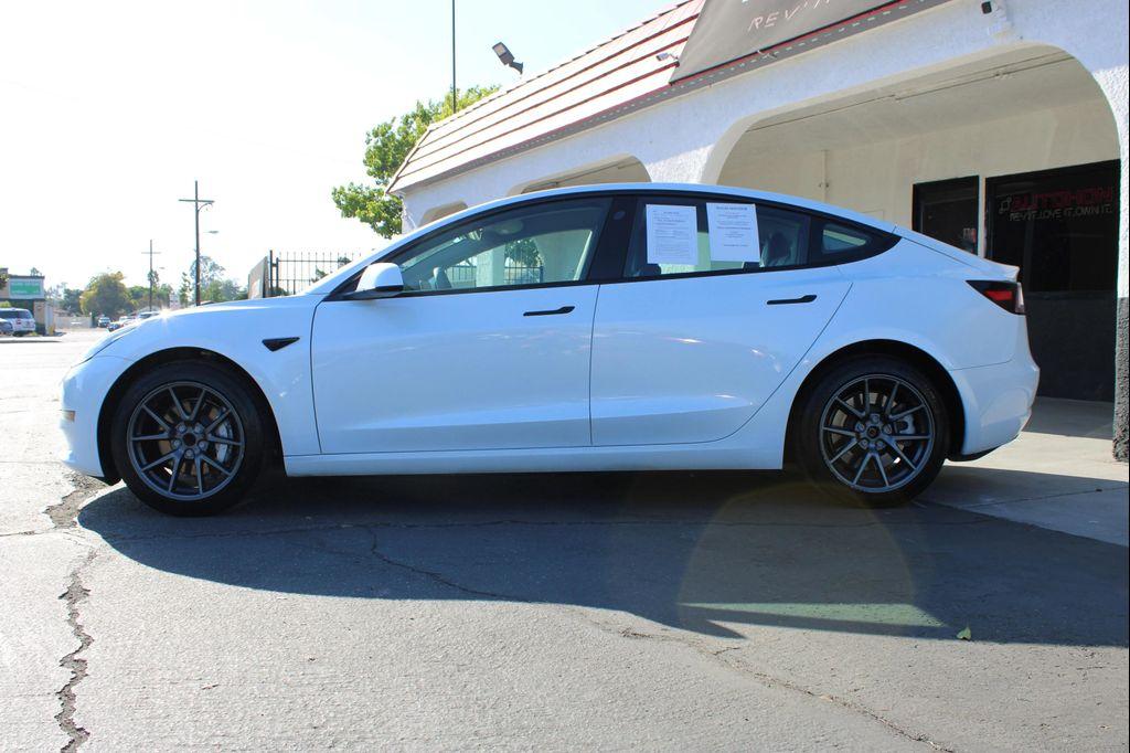 used 2023 Tesla Model 3 car, priced at $22,100