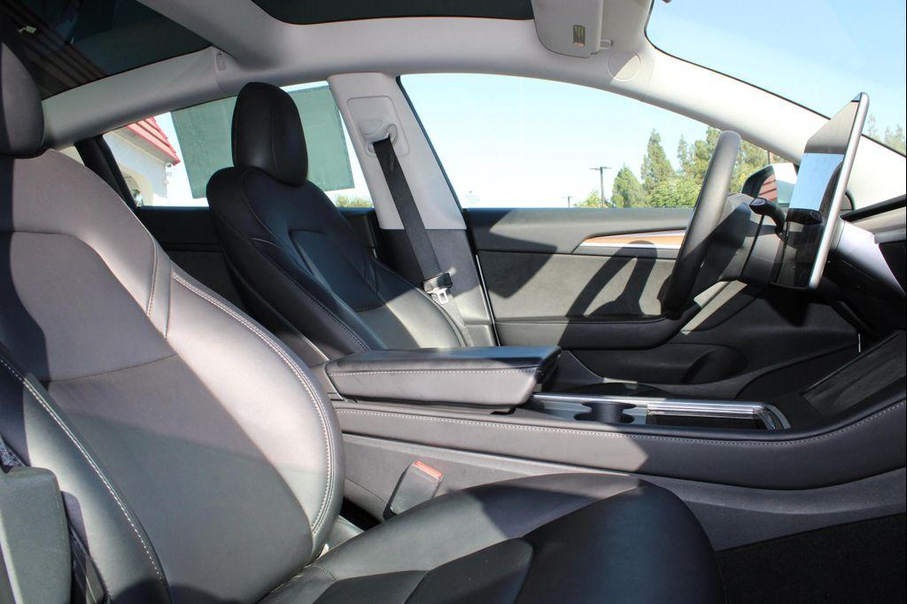 used 2023 Tesla Model 3 car, priced at $22,100