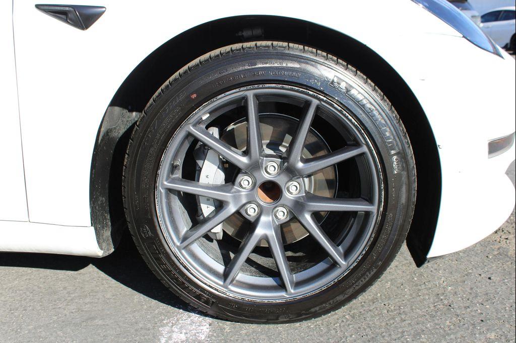 used 2023 Tesla Model 3 car, priced at $22,100