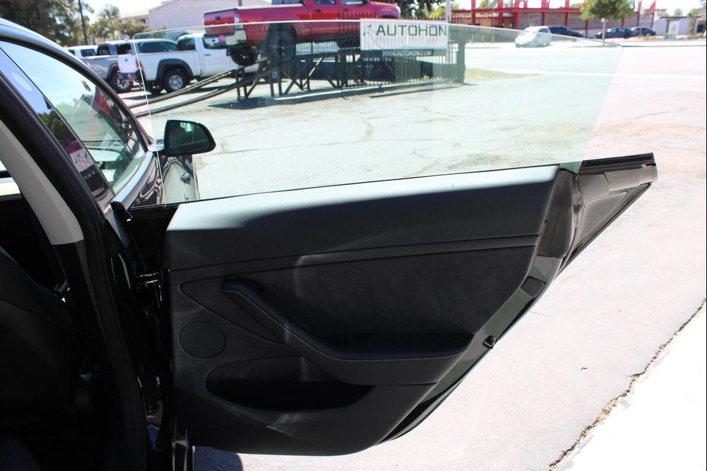 used 2023 Tesla Model 3 car, priced at $23,500