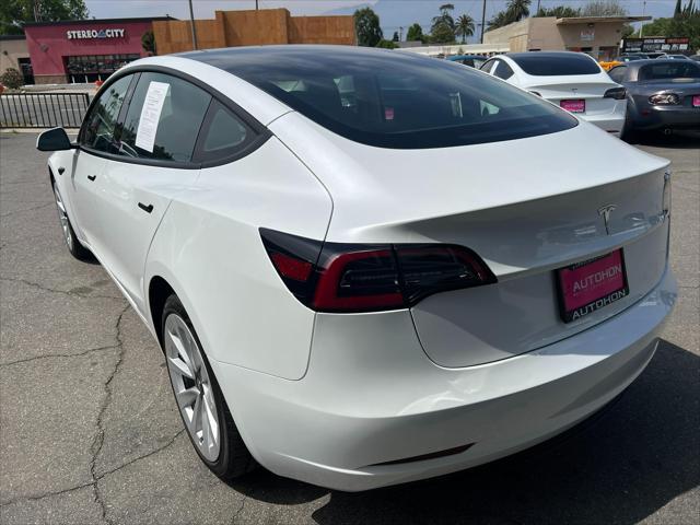 used 2023 Tesla Model 3 car, priced at $24,000