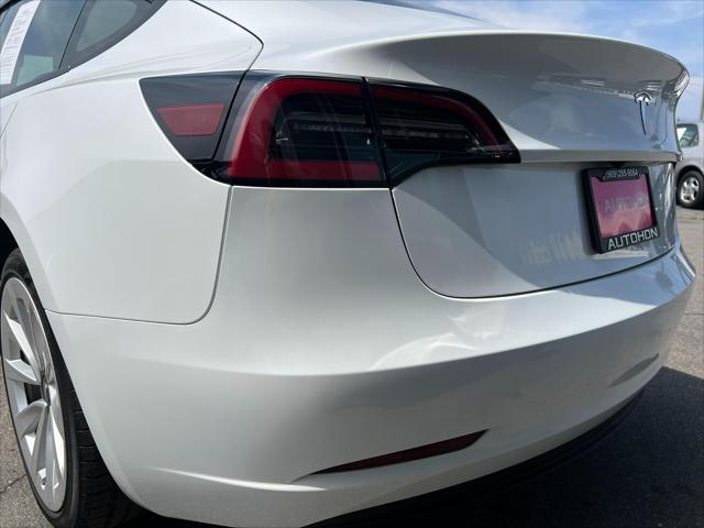 used 2023 Tesla Model 3 car, priced at $24,000