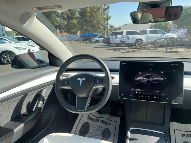 used 2023 Tesla Model 3 car, priced at $24,000