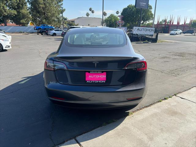 used 2023 Tesla Model 3 car, priced at $24,000