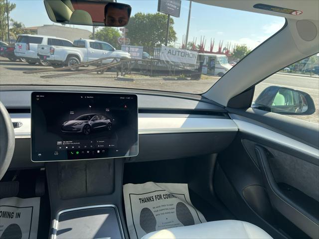 used 2023 Tesla Model 3 car, priced at $24,000
