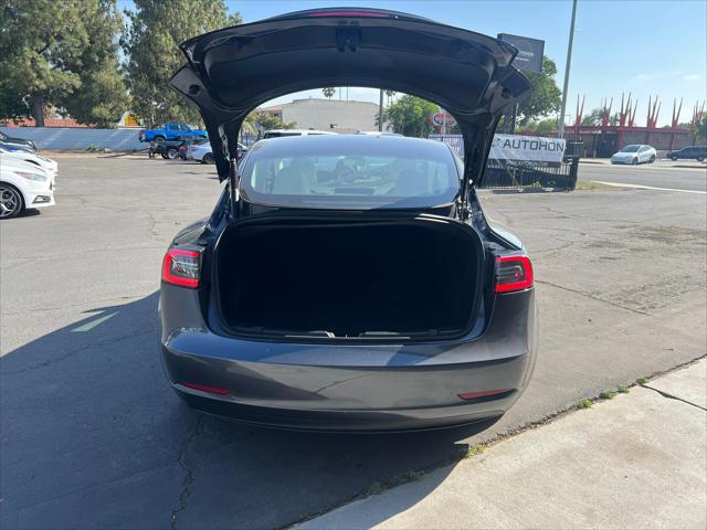 used 2023 Tesla Model 3 car, priced at $24,000