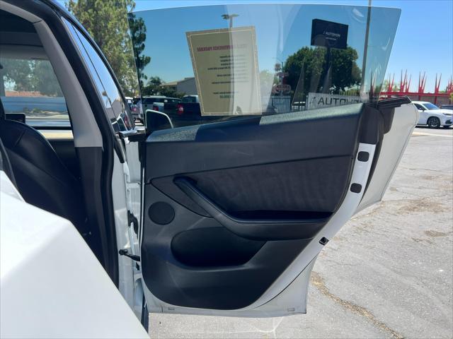used 2021 Tesla Model Y car, priced at $25,000