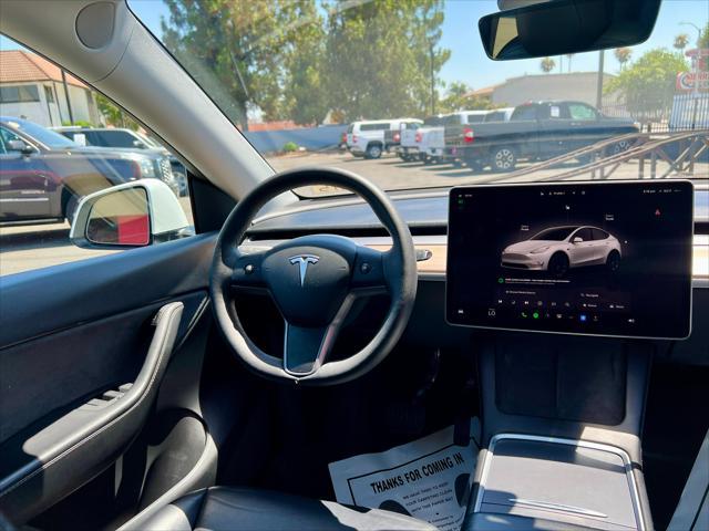 used 2022 Tesla Model Y car, priced at $22,900