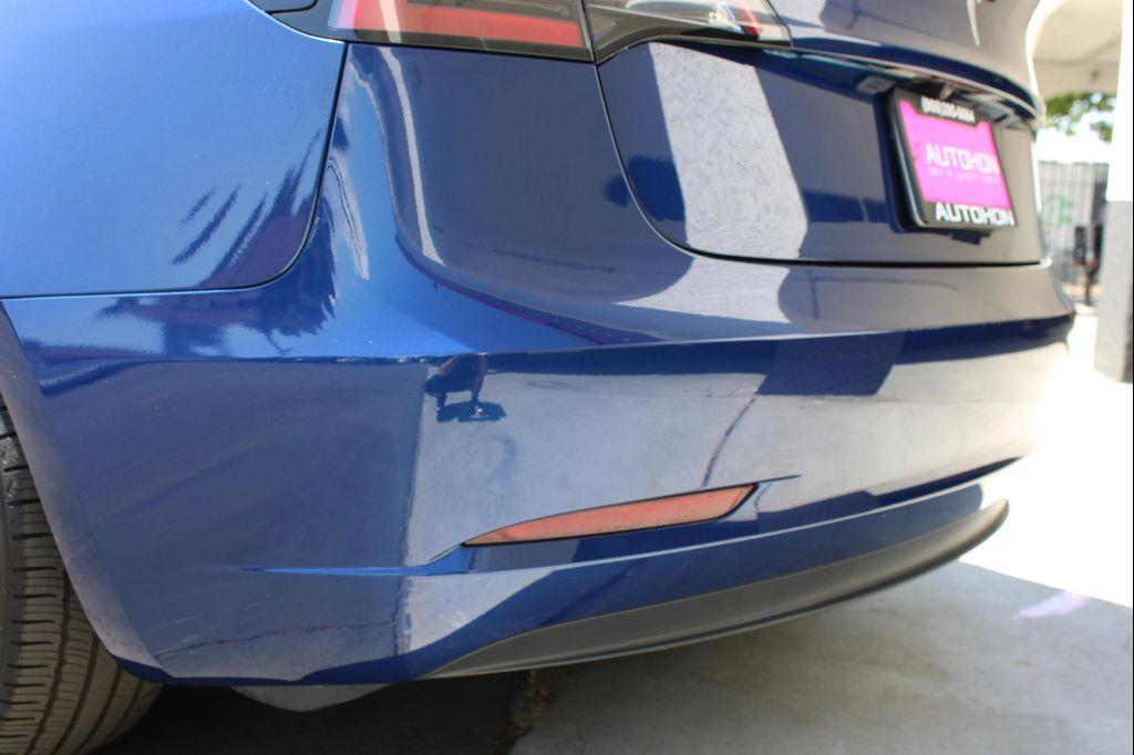 used 2023 Tesla Model 3 car, priced at $23,900