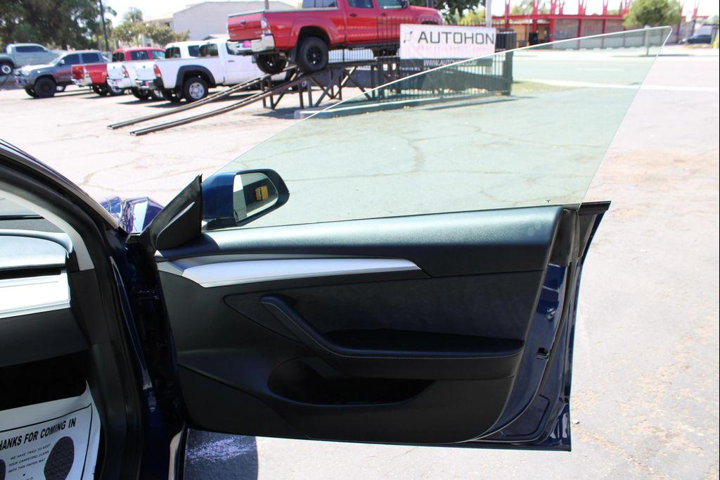used 2023 Tesla Model 3 car, priced at $23,900