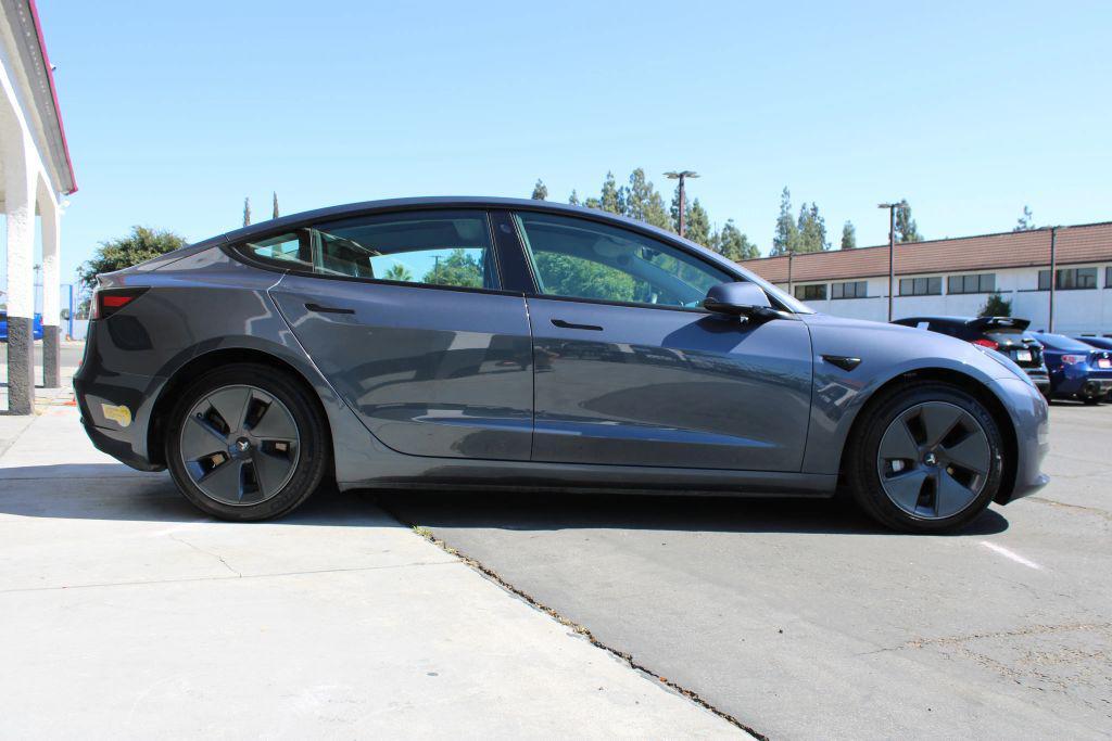 used 2022 Tesla Model 3 car, priced at $22,500