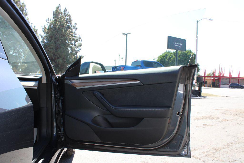 used 2022 Tesla Model 3 car, priced at $22,500