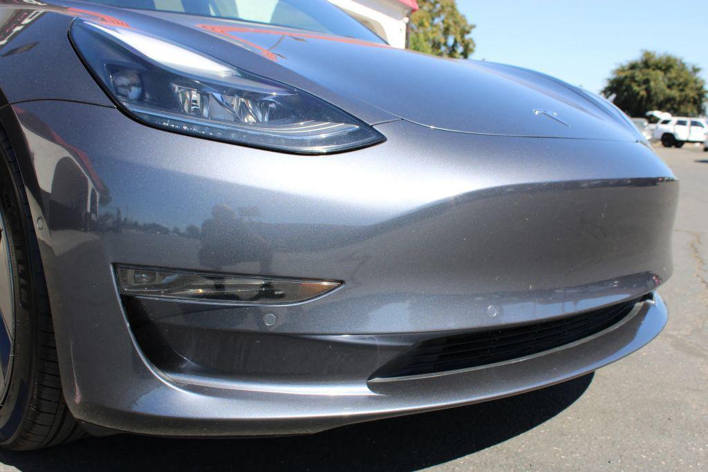 used 2022 Tesla Model 3 car, priced at $22,500