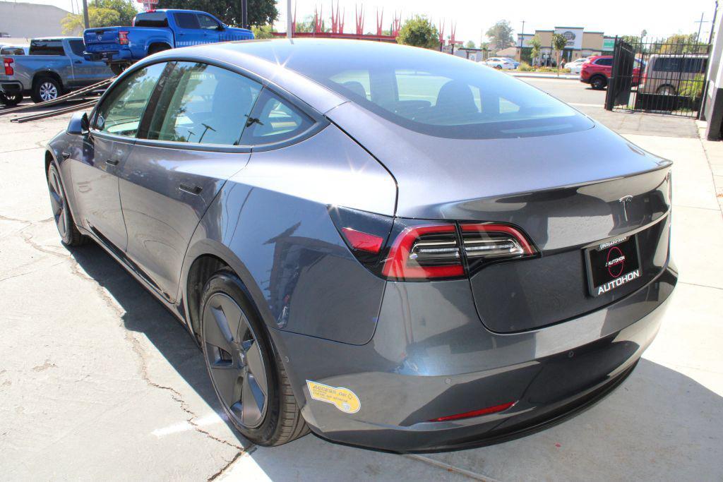 used 2022 Tesla Model 3 car, priced at $22,500