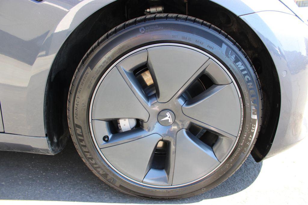 used 2022 Tesla Model 3 car, priced at $22,500