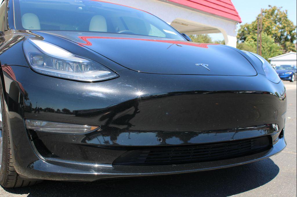 used 2022 Tesla Model 3 car, priced at $24,200