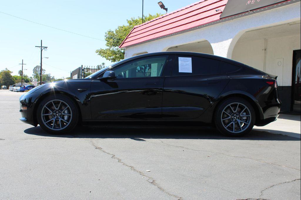 used 2022 Tesla Model 3 car, priced at $24,200