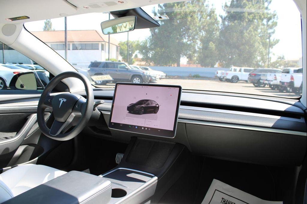 used 2022 Tesla Model 3 car, priced at $24,200