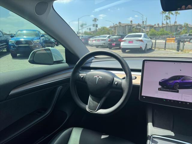 used 2023 Tesla Model 3 car, priced at $24,600