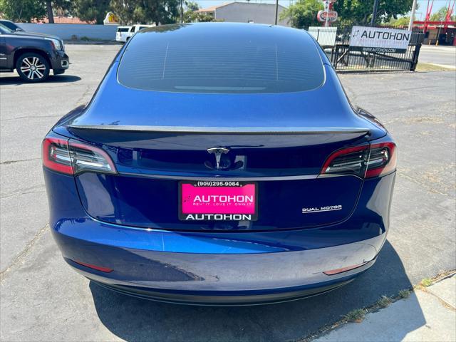 used 2023 Tesla Model 3 car, priced at $25,000