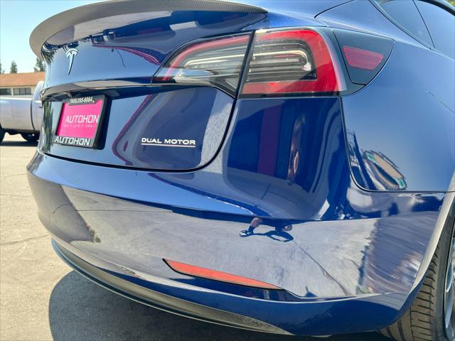 used 2023 Tesla Model 3 car, priced at $25,000