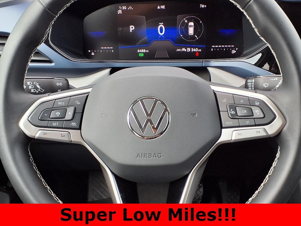 used 2024 Volkswagen Taos car, priced at $25,370