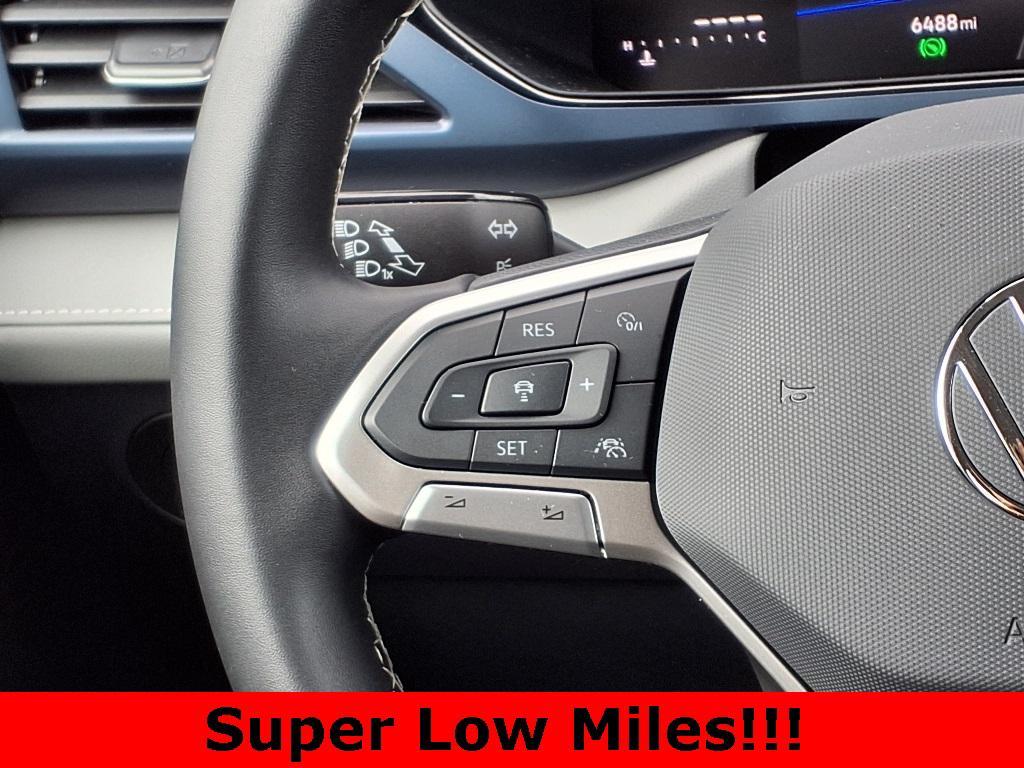 used 2024 Volkswagen Taos car, priced at $25,370
