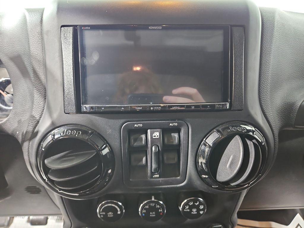 used 2015 Jeep Wrangler Unlimited car, priced at $16,351