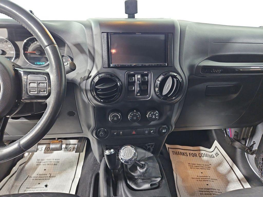 used 2015 Jeep Wrangler Unlimited car, priced at $16,351