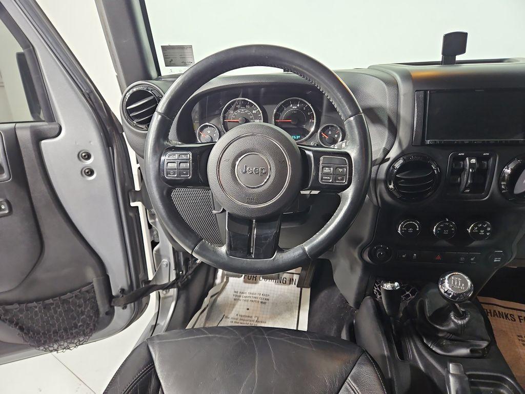 used 2015 Jeep Wrangler Unlimited car, priced at $16,351