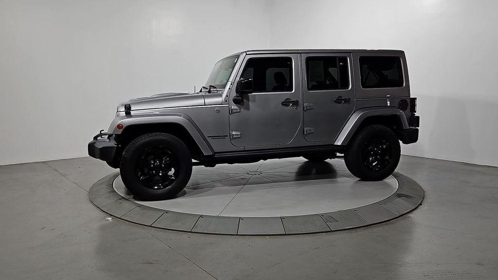 used 2015 Jeep Wrangler Unlimited car, priced at $16,351