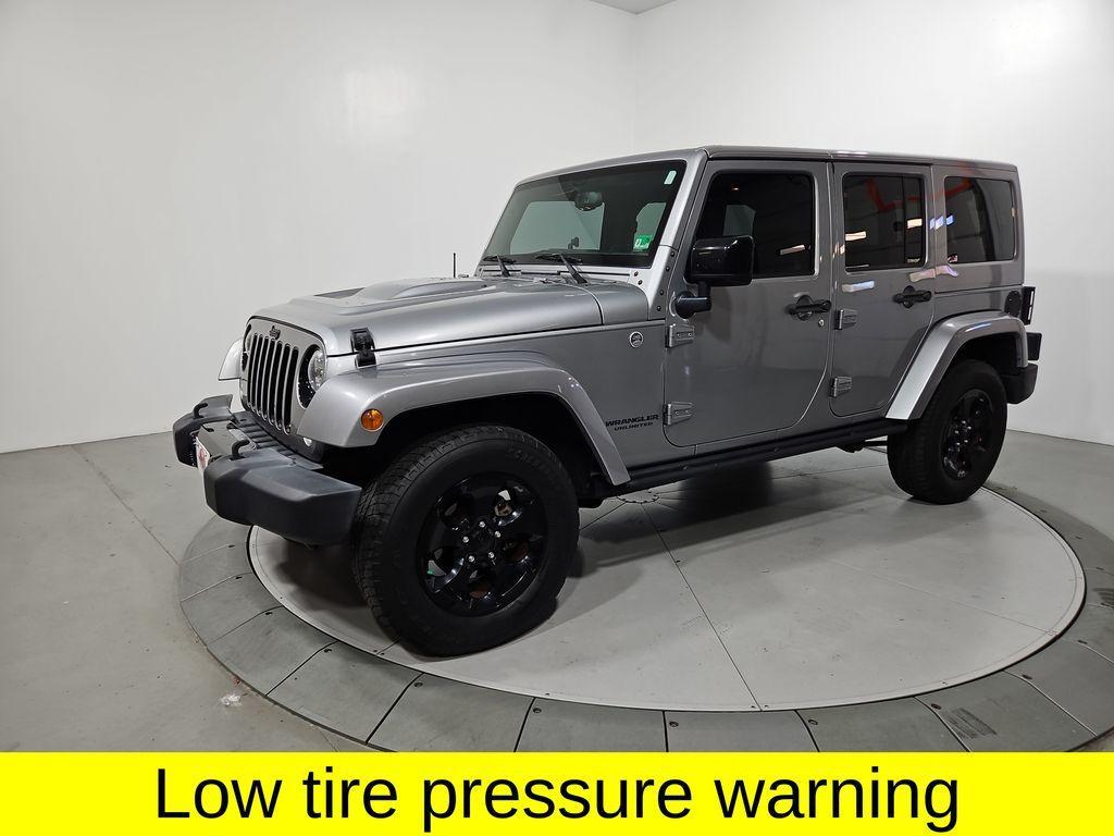 used 2015 Jeep Wrangler Unlimited car, priced at $16,351