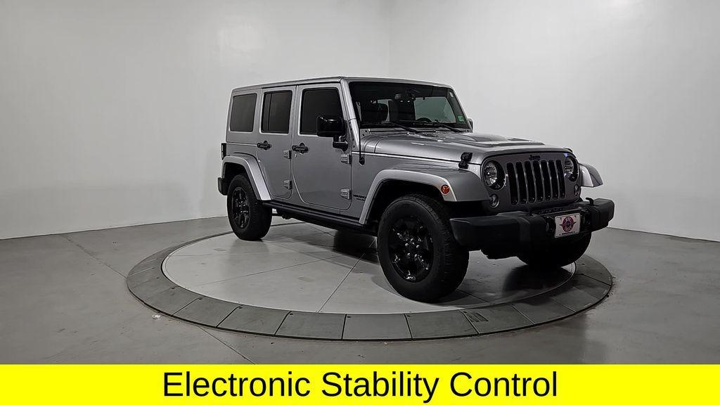 used 2015 Jeep Wrangler Unlimited car, priced at $16,351