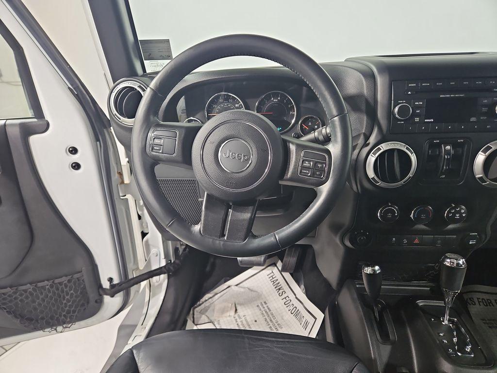 used 2015 Jeep Wrangler Unlimited car, priced at $20,317