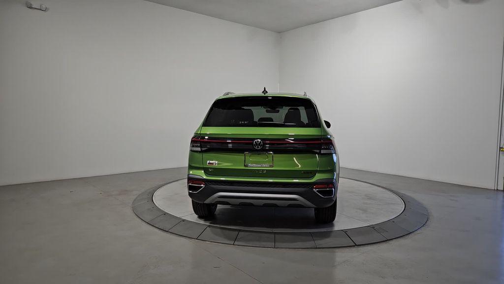 new 2025 Volkswagen Taos car, priced at $30,906