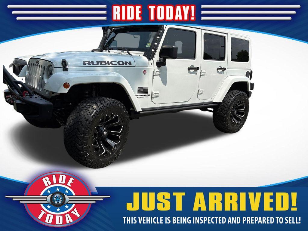 used 2014 Jeep Wrangler Unlimited car, priced at $22,859