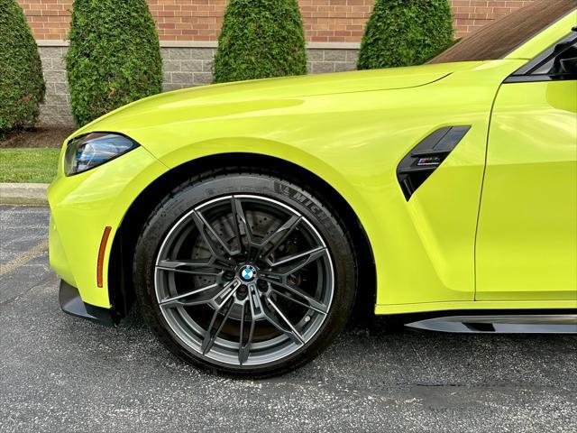 used 2023 BMW M4 car, priced at $68,900