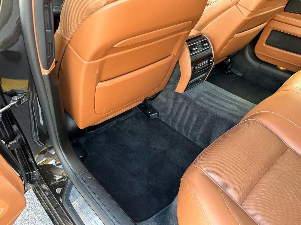 used 2011 BMW 750 car, priced at $16,500