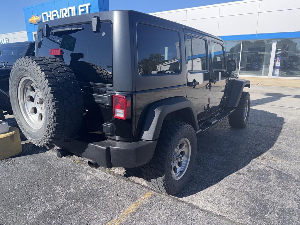 used 2015 Jeep Wrangler Unlimited car, priced at $14,340