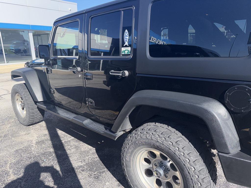 used 2015 Jeep Wrangler Unlimited car, priced at $14,340
