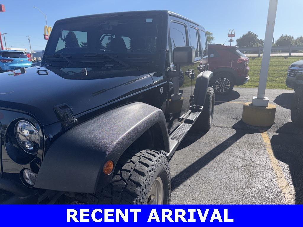 used 2015 Jeep Wrangler Unlimited car, priced at $14,340