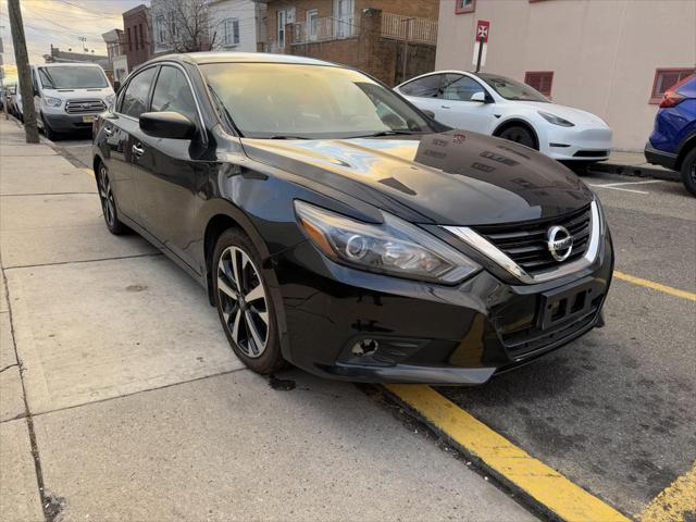 used 2018 Nissan Altima car, priced at $6,995