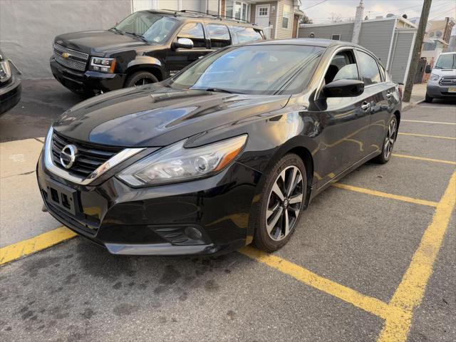 used 2018 Nissan Altima car, priced at $6,995