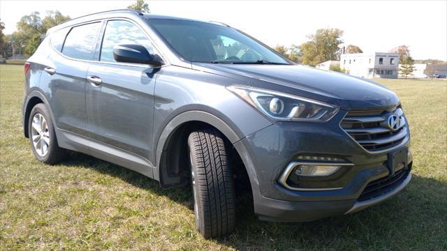 used 2018 Hyundai Santa Fe Sport car, priced at $13,991