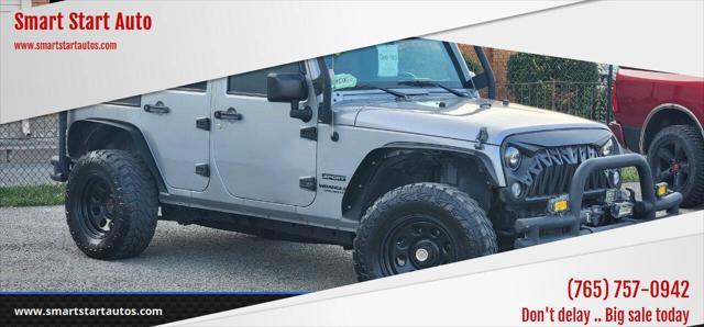 used 2015 Jeep Wrangler Unlimited car, priced at $16,491